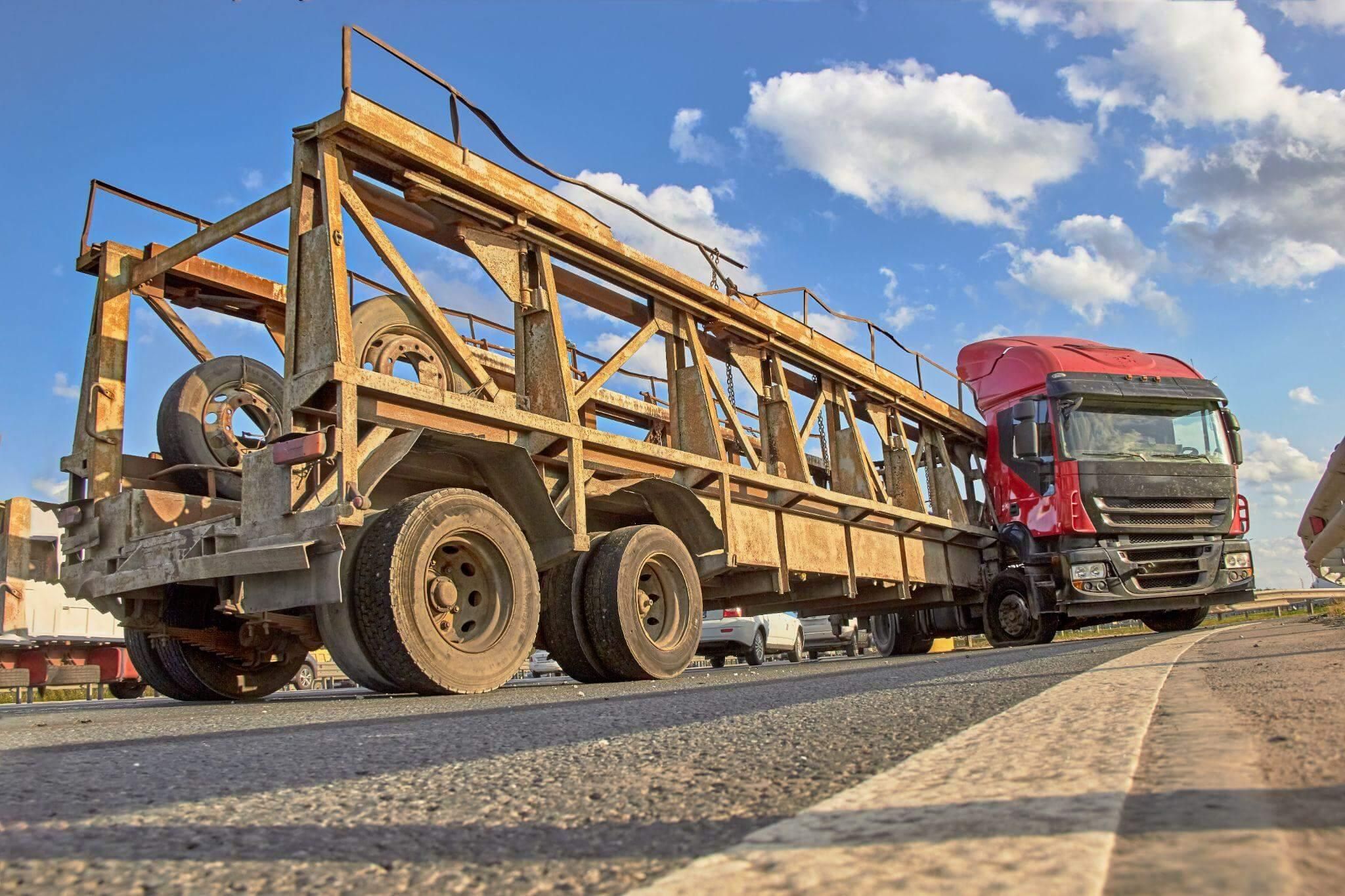 a large truck is driving down the road