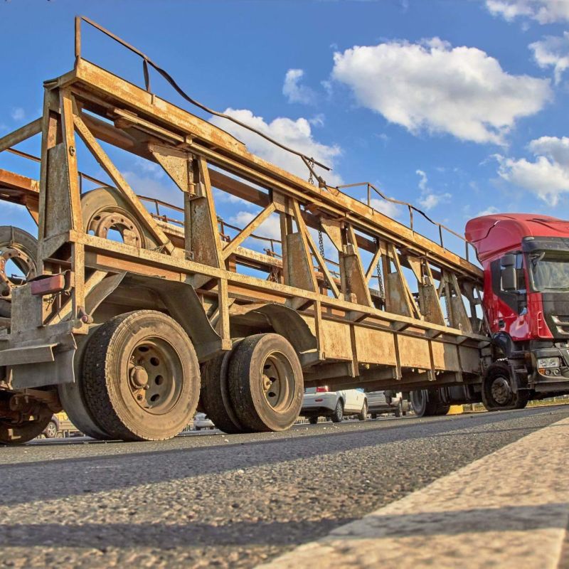 a large truck is driving down the road