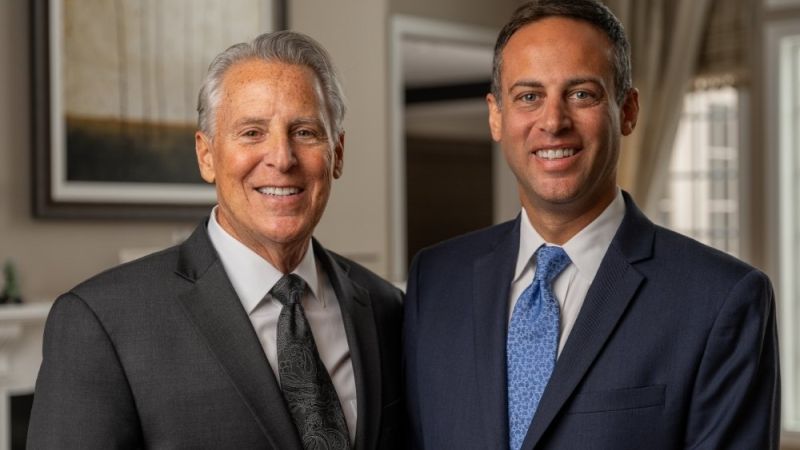 team photo of Jared and Steven Matz. Father and son injury law firm