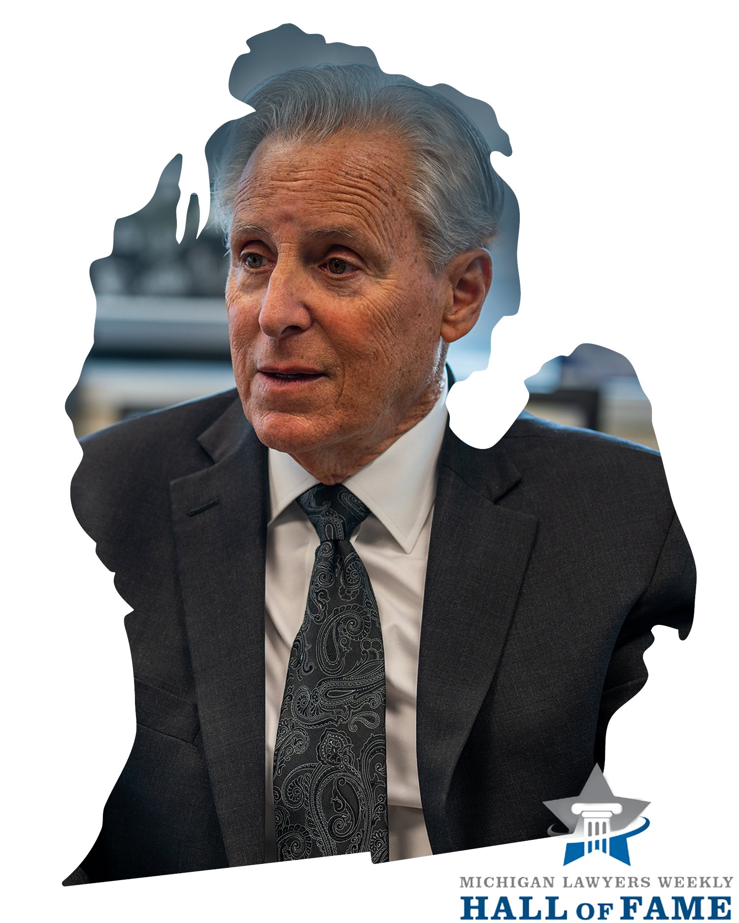 A distinguished man in a suit and tie, featured in Michigan Lawyers Weekly Hall of Fame.