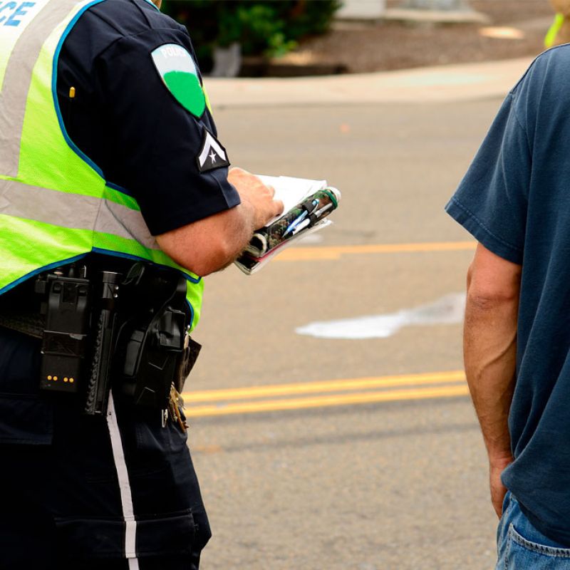 Police officer filling out an accident report