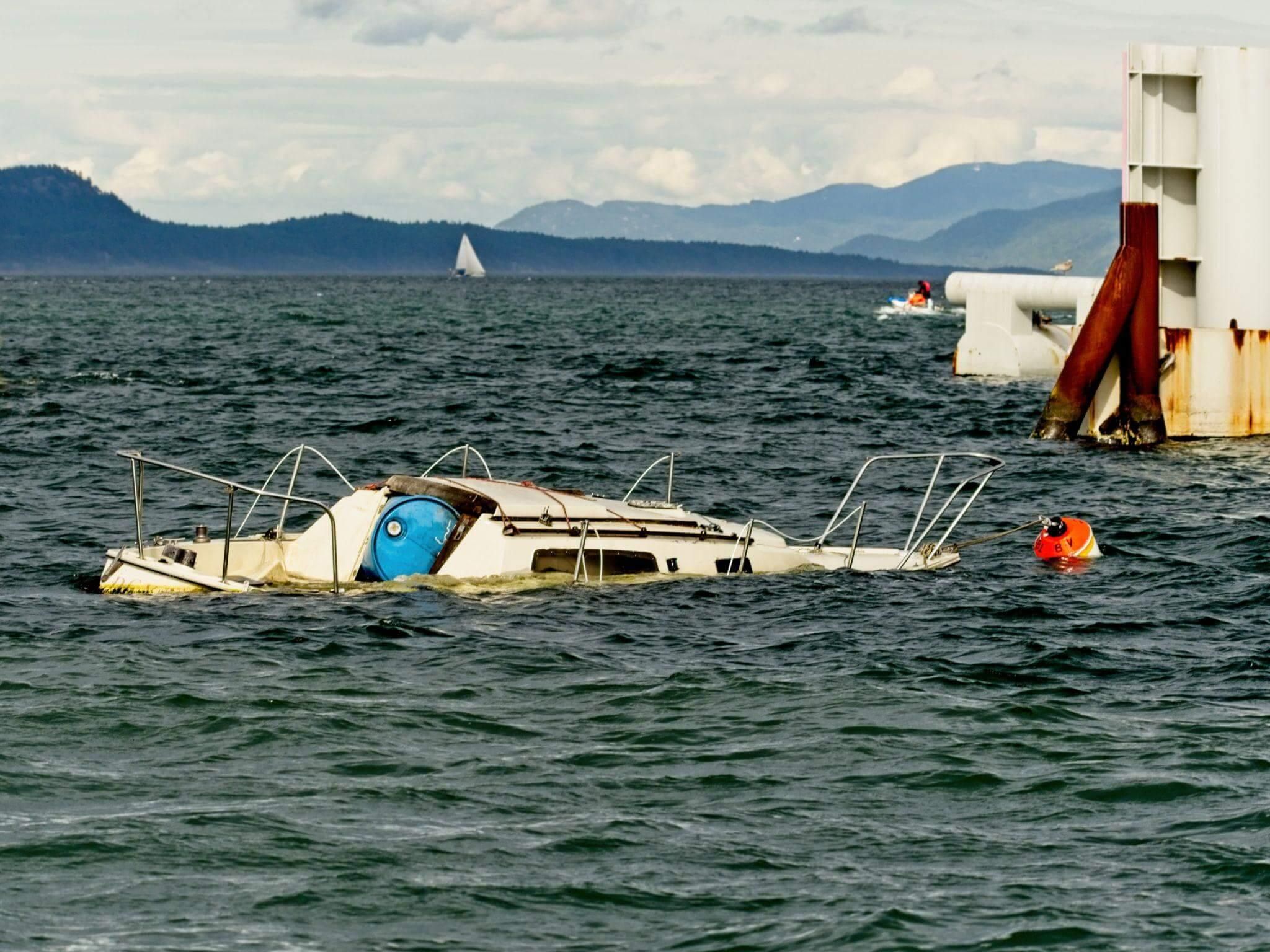 a small boat in the middle of a body of water