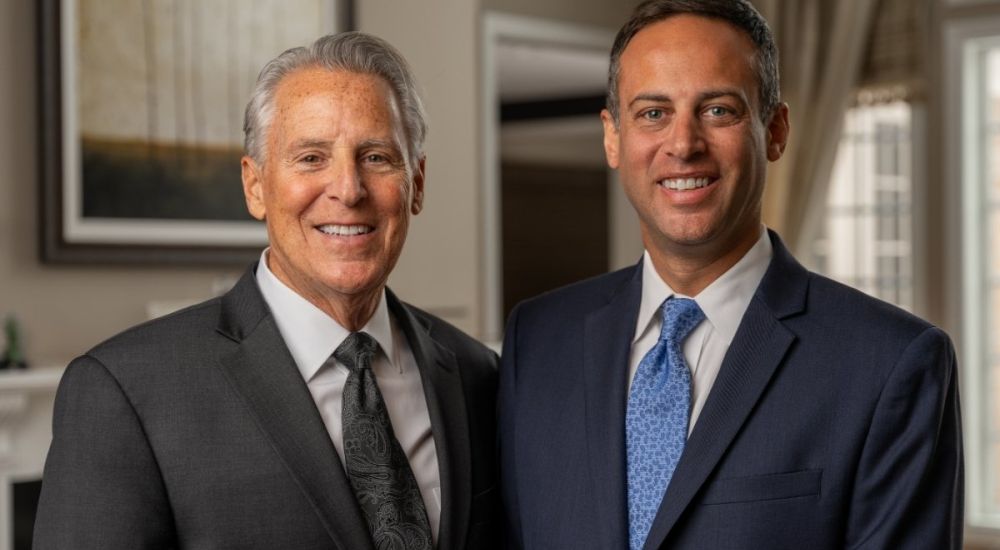 team photo of Jared and Steven Matz. Father and son injury law firm