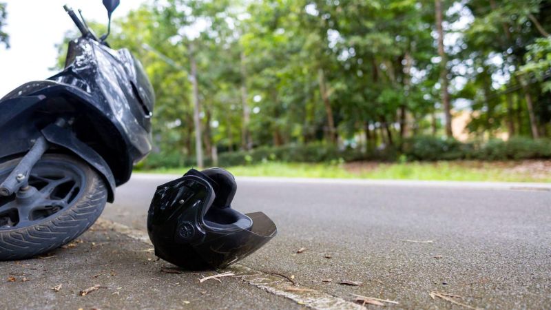 Motorcycle accident scene on the road