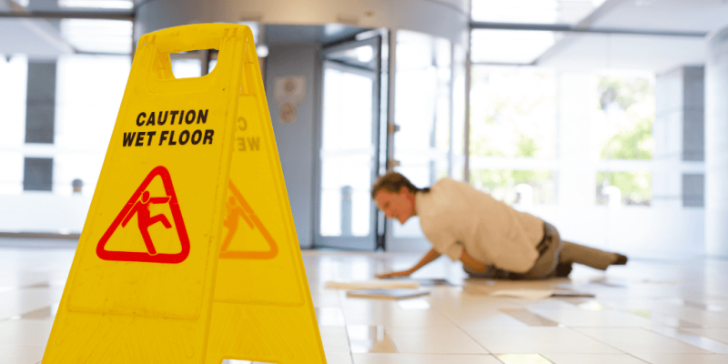caution wet floor sign in a school