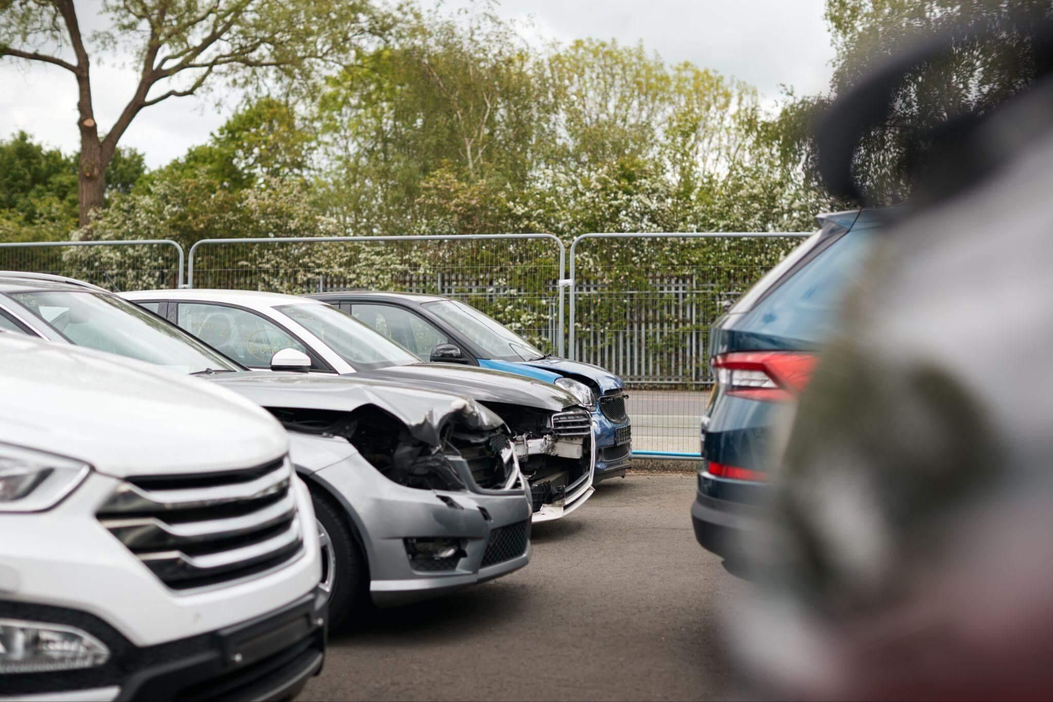 a bunch of cars that are parked in a lot