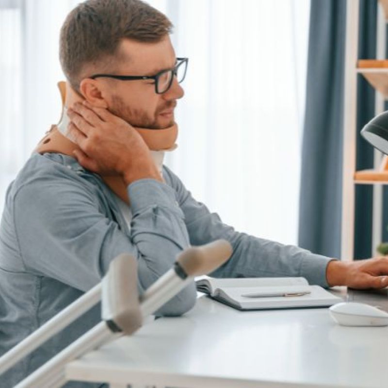 man wearing a neck brace