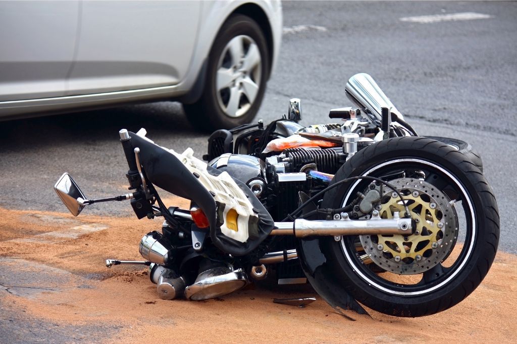 motorcycle laying on ground