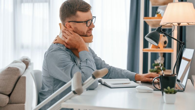 | Matz Injury Law man wearing a neck brace