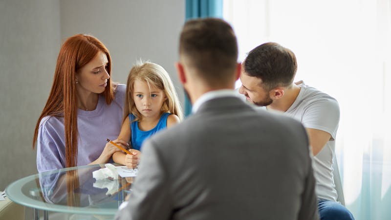 Family and lawyer supporting child after injury at school