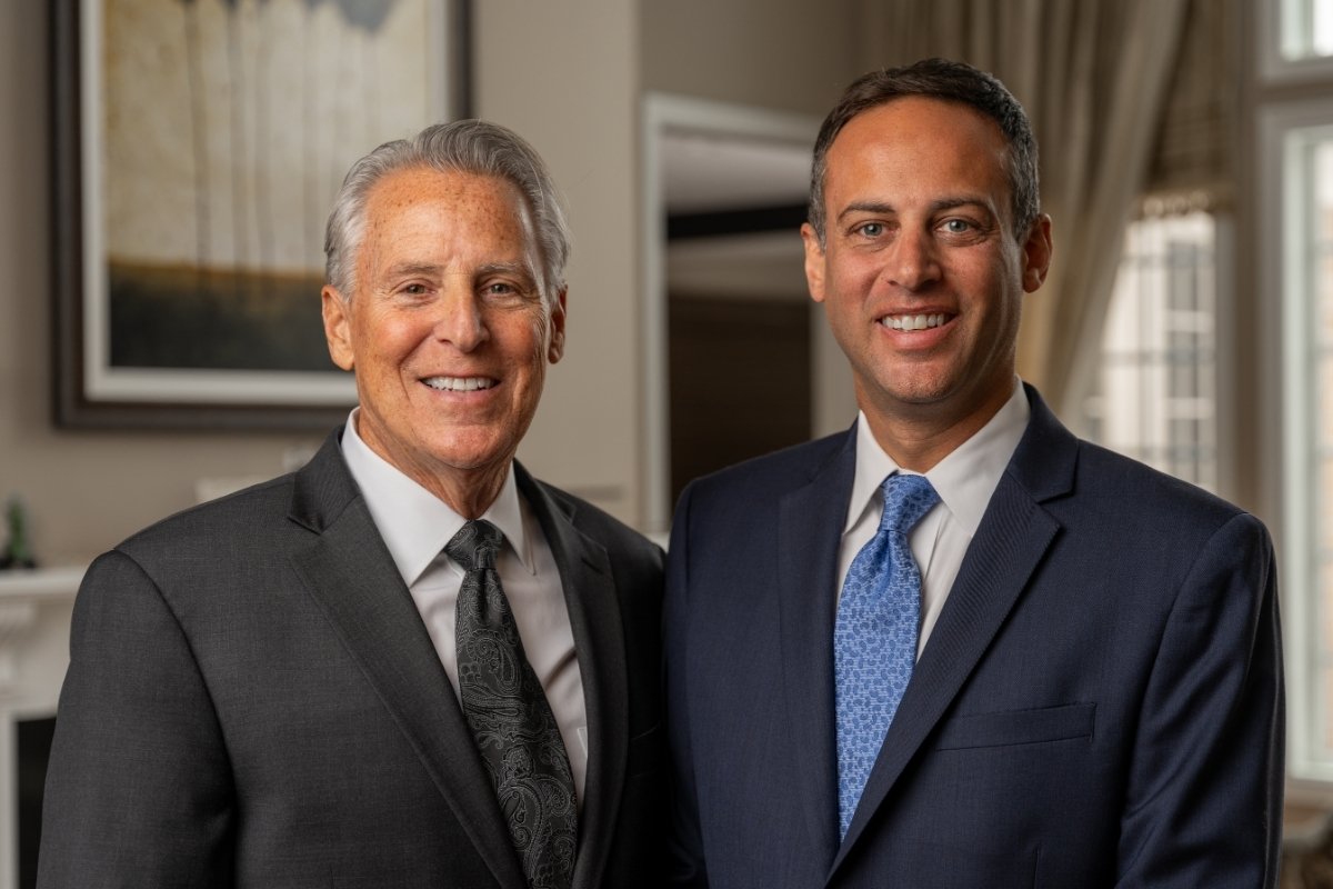 team photo of Jared and Steven Matz. Father and son injury law firm