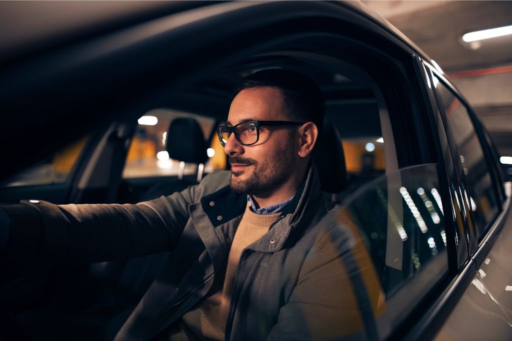 Man driving at night