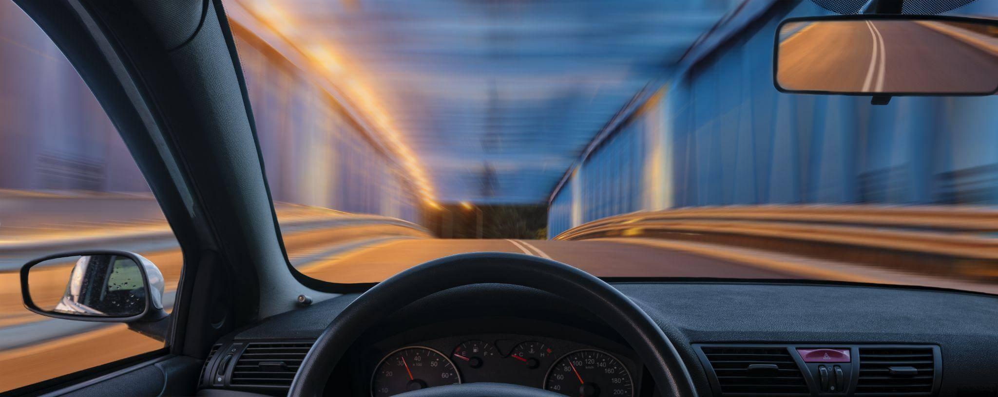 Inside a car view of a tunnel, self-driving context