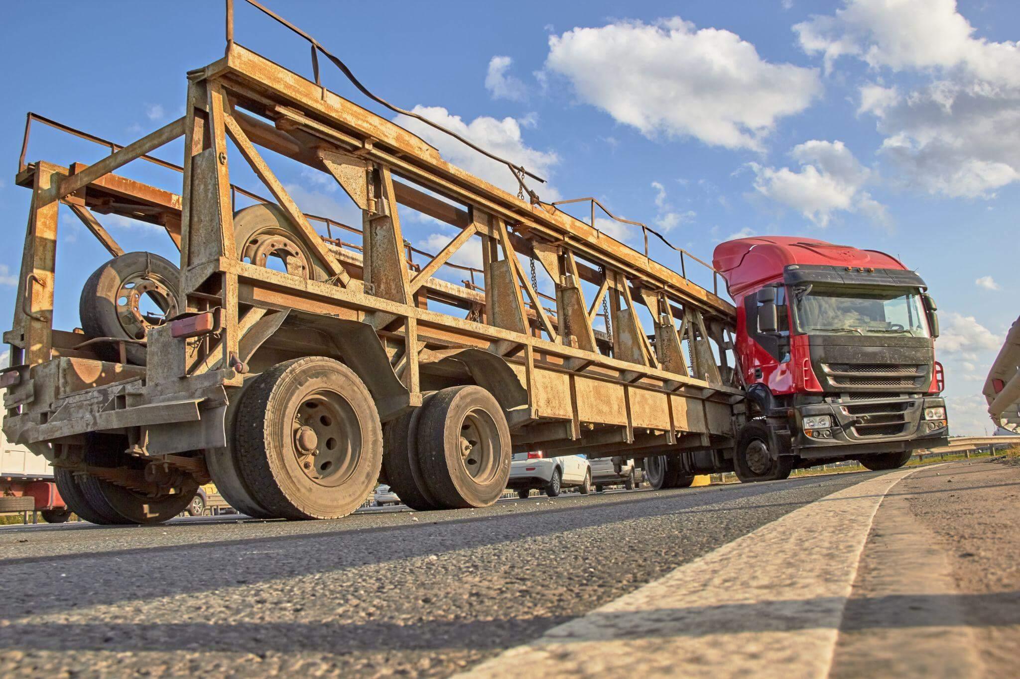 a large truck is driving down the road